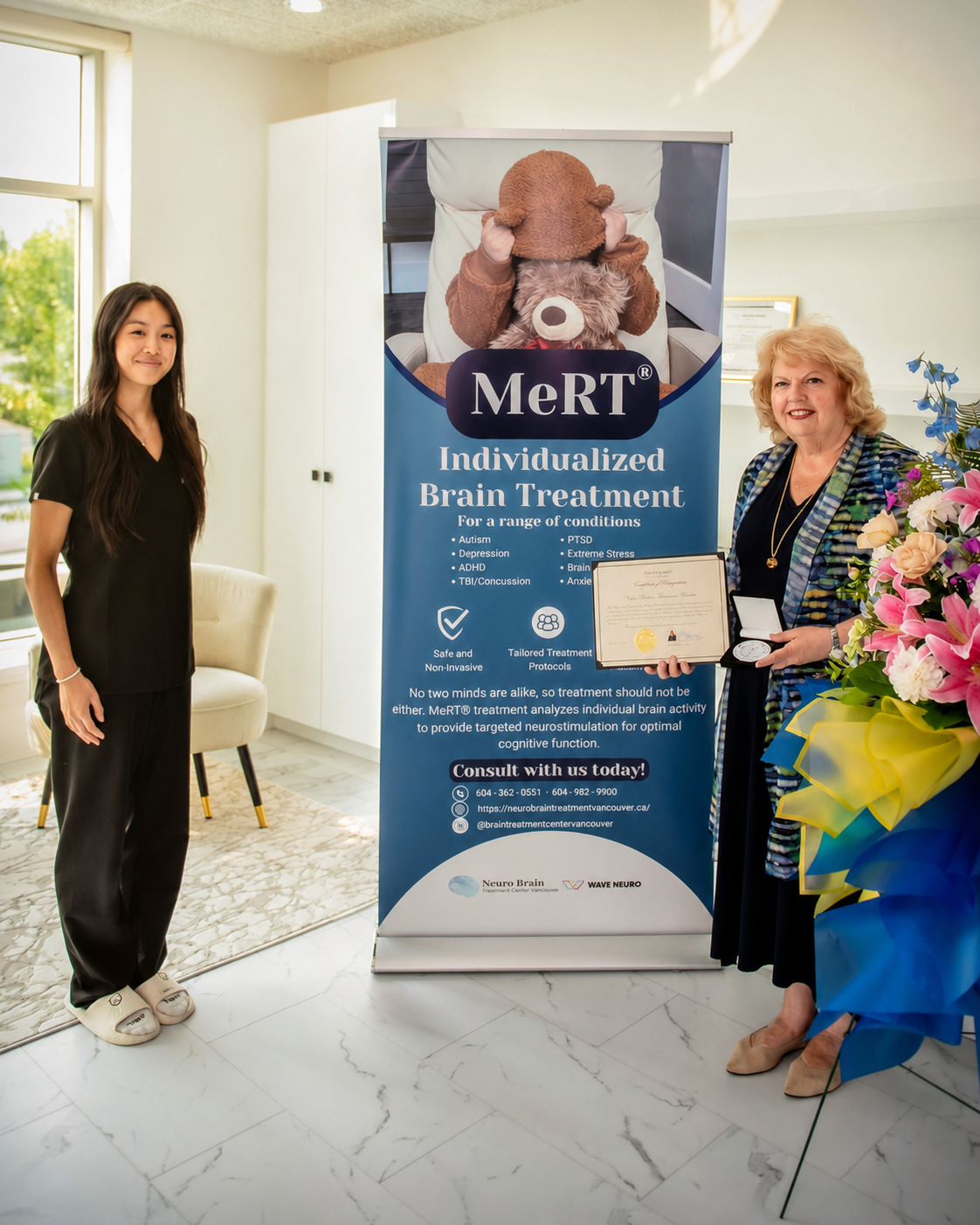 Mayor of Surrey visiting Neuro Brain Treatment Centre Vancouver for the clinic's first anniversary, presenting a Certificate of Recognition