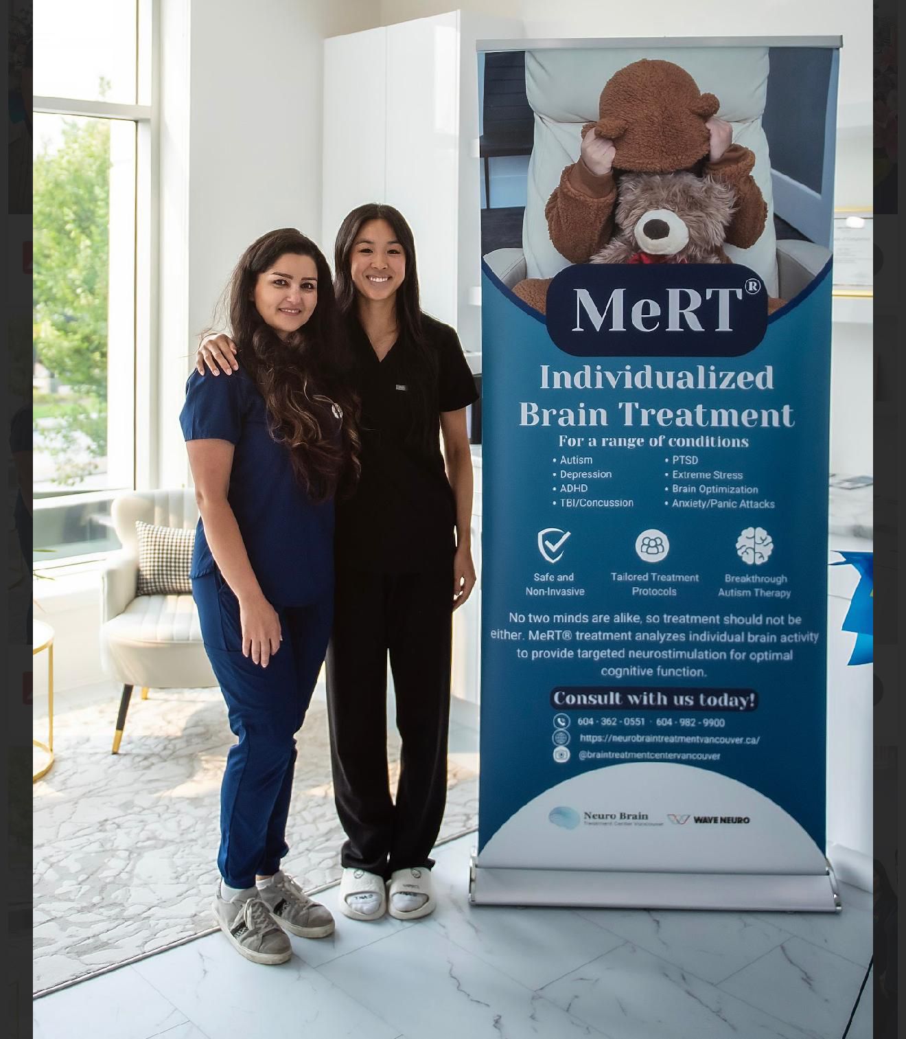 The clinical team beside the MeRT® individualized brain treatment poster