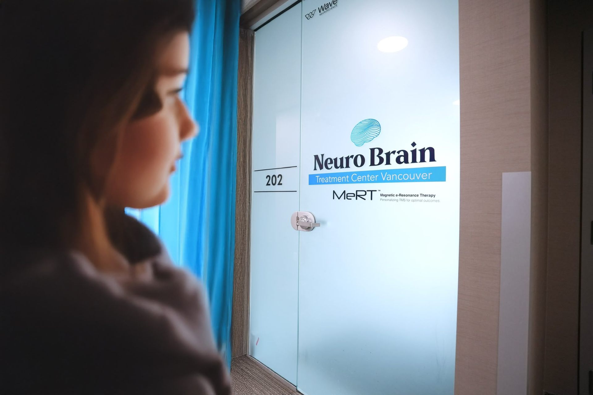 The frosted glass entry to Suite 202 - Neuro Brain Treatment Center Vancouver