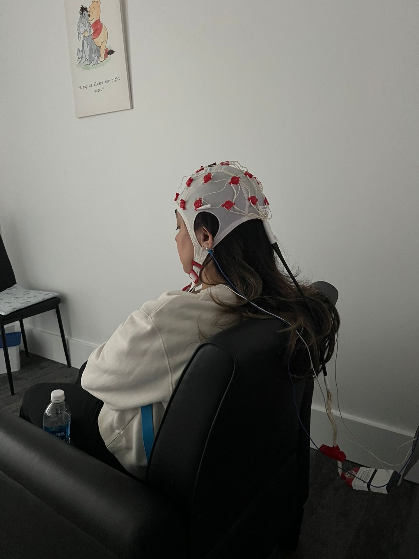 A patient wearing a qEEG cap during brain mapping at Neuro Brain Treatment Centre